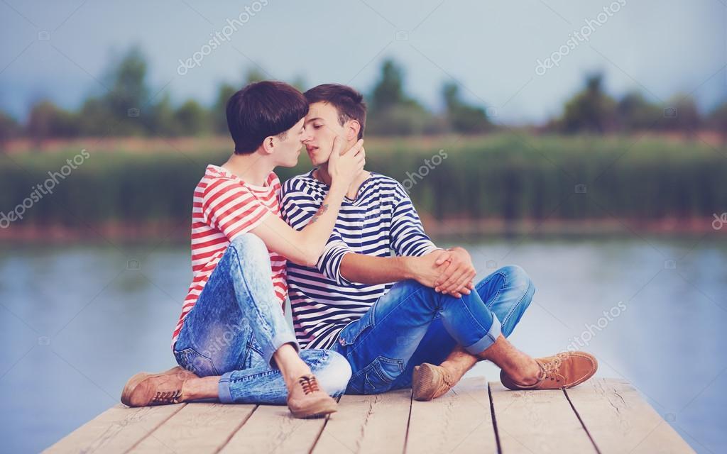 Depositphotos 75907765 stock photo gay couple kissing on wooden